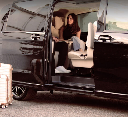 Airport chauffeur car with passengers and luggage