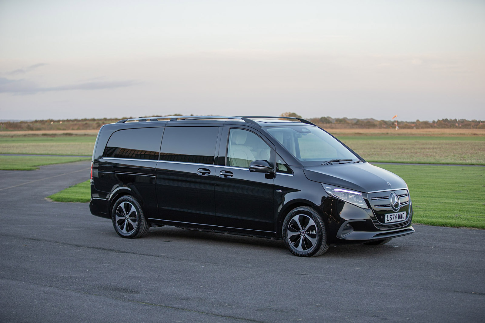 Black Mercedes MPV chauffeur vehicle